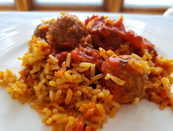 Vegan Baked Meatballs in Tomato Sauce With Rice